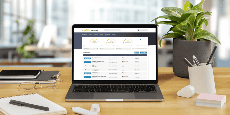 Agilio Dental iService dashboard on laption screen
